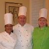 Visiting with fellow chefs at fundraising event 
